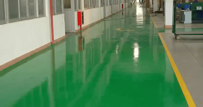 A factory floor professionally covered and marked with epoxy flooring in Fresno, CA
