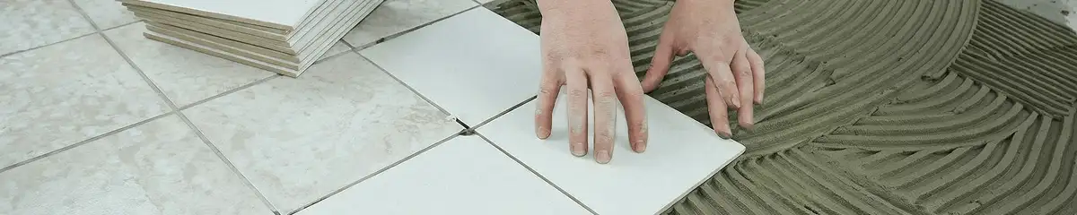 Professional installing white tile floors in Fresno, CA