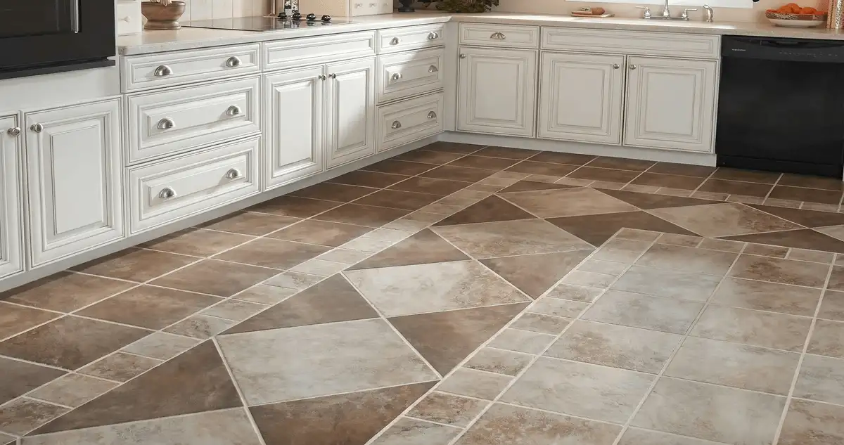 Kitchen with white cabinets and a professionally installed tile floor in Fresno, CA