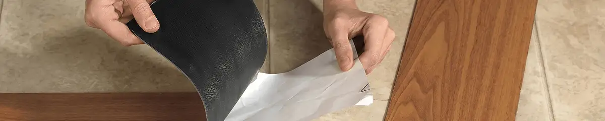 A professional installing vinyl flooring in Fresno, CA